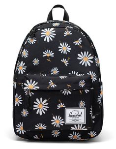 Herschel Supply Co. Classic Backpack. This Classic Backpack Has Got You Covered With A 13/14" Laptop Sleeve And A Side Water Bottle Pocket. Signature Striped Lining In The Main Compartment. Front Pocket To Carry Some Of Your Smaller Essentials. Branded Patch On Front Pocket. Padded Back. Padded And Adjustable Shoulder Straps. Volume: 26l. 17" H X 12.5" W X 6.5" D. Made With Ecosystem™ Recycled Fabrics. Imported. Black Standard Backpack For Summer, Summer School Backpack With Zipper Closure, Black Summer Standard Backpack, Black Summer Backpack, Summer School Backpack Softback, Summer School Backpack In Softback Style, Summer School Softback Backpack, Summer School Backpack With Adjustable Strap, Black Backpack For Spring