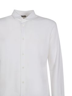 White Cotton Shirt from Zanone -Cotton shirt -Long sleeves -Italian collar -Button closure -Made in Italy -Colour: White -100% Cotton Classic Tops With Lapel Collar And Buttons, White Long Sleeve Top With Concealed Placket, White Shirt With Button Cuffs And Fold-down Collar, Office Shirt With Collared Hidden Button Closure, Classic Tops With Lapel Collar And Placket, Office Shirt With Hidden Button Closure And Collared Shape, Business Tops With Buttons And Lapel Collar, Office Shirt With Hidden Button Closure And Collar, White Business Shirt With Fold Down Collar