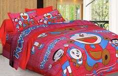 a bed with red sheets and cartoon characters on it