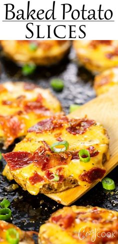 baked potato slices with bacon and green onions on a baking sheet, ready to be eaten