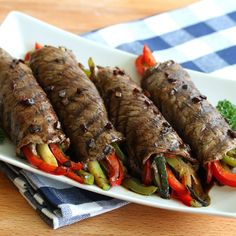 a collage of photos showing different types of vegetables and meats on skewers with the words balsamic glazed steak rolls