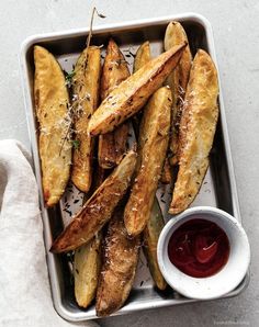 baked french fries with ketchup and parmesan cheese