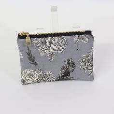 Explore the practicality of our Raven Gray Coin Pouch, a compact solution for your coins and small items. This coin pouch combines style and functionality, making it a perfect mini wallet or accessory holder. The unique design adds a sophisticated touch to your daily routine. Imagine easily finding your small essentials in this stylish pouch. Order now and keep your belongings neatly organized! Versatile Coin Purse With Removable Pouch, Versatile Everyday Coin Purse With Zipper, Everyday Use Coin Purse Clutch, Versatile Pouch Coin Purse, Versatile Everyday Coin Purse Pouch, Versatile Clutch Coin Purse For Daily Use, Wallet With Zipper Pocket Pouch For Personal Use, Everyday Zipper Pouch Coin Purse, Versatile Coin Purse With Removable Pouch For Daily Use