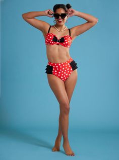 Feel cute like polka dots with these swim bottoms inspired by Minnie Mouse. Made in her iconic colors of red and white  its covered in polka dots and Minnie Mouse heads  plus black ruffle detailing all around. Pair with the matching top to complete your look!Top not included.Swimwear can only be returned unworn with original tags intact and sanitary panel in place.82% polyester; 18% spandexHand wash cold; dry flatImportedListed in junior sizesModel is 5'9''Model wears size Small Disney Princess Bikinis, Disney Swimwear, Hoodie Girl, Swim Bottoms, Matching Top, Black Ruffle, Hot Topic, Bathing Suits, Minnie Mouse