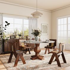 a dining room table with four chairs and a vase on top of it in front of two windows