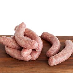 several sausages are stacked on top of each other