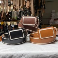 Need a durable, life lasting and nice looking belt? Really nice solid genuine leather belt with a 1.5 inch width made for any occasion and event. Made to be put through any activity and still be in a great condition! Looks great for style and works better when needed. Made from stainless steel hardware with a solid color design. Available in 3 different colors brown, maroon and black! All have a nice embroidery style design to choose the right one that best suits you. Available in all sizes 30-4 Black Leather Embroidered Belt Buckles, Adjustable Embroidered Leather Belt, Brown Leather Belt With Embroidery, Brown Embroidered Leather Belt, Vintage Rectangular Leather Belt Buckles, Leather Western Belts For Everyday, Brown Rectangular Leather Belt, Vintage Leather Belt Rectangular Shape, Brown Leather Rectangular Belt Buckles