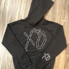 This Hoodie is the The Weeknd Hoodie with Outline XO Design on the Chest and Sleeve with White Designs on a Black Hoodie. The Weeknd Hoodie, Weeknd Merch, The Weeknd Merch, The Weeknd Trilogy, Xo Design, Hoodie Diy, Swaggy Outfits, Clothes Ideas, The Weeknd