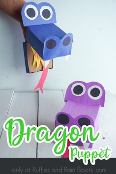 the dragon puppet is made from construction paper