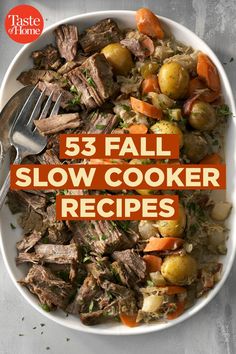 a white bowl filled with meat, potatoes and carrots next to a fork on top of a table