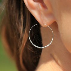 Beautiful sterling silver hammered hoop earrings. These hoops are med/large at 40mm x 40mm. Also available in gold filled and rose gold filled. Please choose at checkout. Thank you for viewing! We look forward to serving you. LEMONCAKE Earrings Silver Hoops, Hoop Earrings Large, Hoop Earrings Silver, Hammered Hoop Earrings, Contemporary Earrings, Hammered Earrings, Gold Filled Hoops, Hoop Earrings Gold, Tiny Studs