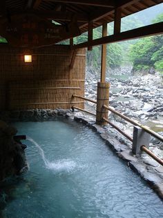 an outdoor hot tub with water running through it