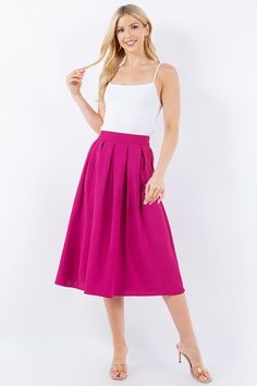 Vintage vibes with our box pleats midi skirts. Wear yours with a graphic t-shirt and sneakers, or dress it up with a fitted top and heels. Make it your own style for any occasion. Fit is true to size. Waistband has back elastic for stretch. Fabric: 100% polyester. Spring Stretch Midi Pleated Skirt, Chic Summer Midi Pleated Skirt, Chic Summer Pleated Midi Skirt, Trendy Summer Full Pleated Skirt, Trendy Full Pleated Skirt For Summer, Casual Pleated Midi Skirt For Spring, Summer Midi Length Pleated Skirt For Day Out, Trendy Pleated Flared Skirt For Spring, Trendy Summer Midi Pleated Skirt