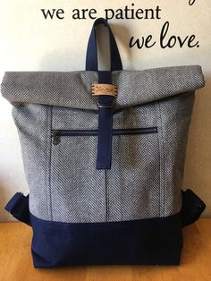 "Ready to ship fold-top cotton canvas backpack. Wherever you're headed, take this roomy backpack with you. It's got room for everything you need. This backpack is made using navy blue canvas and a herringbone print canvas for the exterior with a green cotton interior printed with small flower dots. The exterior pocket is pleated, giving it the flexibility to create extra space if you need it. The inside features a slip pocket for easy access. FEATURES: * zippered exterior pocket * interior slip African American Dolls, Backpack For Women, Handmade African, Canvas Backpack, Blue Canvas, Waxed Canvas, Cat Friendly, Carry On Bag, Backpack Purse