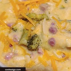 broccoli and cheese casserole in a white bowl