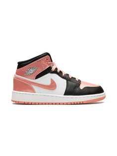 Air Jordan 1 Mid sneakers from Jordan Kids featuring white, black, coral pink, leather, signature Swoosh logo detail, signature Air Jordan Wings logo, contrasting panel detail, round toe, front lace-up fastening, logo patch at the tongue, ankle-length, branded insole and rubber sole. These styles are supplied by a premium sneaker marketplace. Stocking only the most sought-after footwear, they source and curate some of the most hard to find sneakers from around the world.. | Jordan Kids Air Jorda Casual Pink Jordan Shoes For Streetwear, Pink High-top Sneakers With Contrast Sole And Round Toe, Pink High-top Sneakers With Contrast Sole, Casual Pink Low-top Jordan Shoes, Pink Leather High-top Sneakers With Contrast Sole, Pink Mid-top Custom Sneakers For Streetwear, Sporty Mid-top Pink Skate Shoes, Pink Mid-top Sporty Skate Shoes, Pink Leather High-top Custom Sneakers