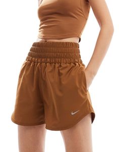 Shorts by Nike Training A gym-bag essential High rise Elasticized waistband Pocket details Nike branding Regular fit Sporty Brown Athletic Shorts For Workout, Brown Athleisure Workout Shorts, Brown Athleisure Shorts For Workout, Sporty Brown Activewear Shorts, Sporty Short Brown Activewear, Sporty Brown Short Activewear, Sporty Stretch Athletic Shorts In Brown, Sporty Stretch Brown Athletic Shorts, Brown Athletic Shorts For Sports