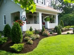 a house with landscaping in the front yard