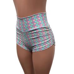 Sexier and more flattering! Our classic booty shorts made in pastel mermaid print spandex with ruching on each side. Made to flatter your figure and move with you. The standard inseam is 2.5" - but can be customized. Choose between low-rise, mid-rise and high-waist (high-waist shown in photos). Fitted Ruched Shorts, Stretch Ruched Shorts, High Waist Fitted Yoga Shorts, Fitted High-waist Yoga Shorts, Summer Swimming Bottoms With Ruched Sides, Pink Ruched Summer Bottoms, Fitted Swimwear With Elastic Waistband And Short Leg, Fitted Swimming Shorts With Elastic Waistband, Stretch Ruched Short Bottoms