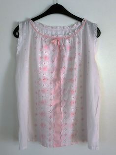 Vintage babydoll nightdress embroidered with roses White and pink cotton batiste with Richelieu lace and embroidered with white and pink Dimensions: chest width 54 cm and length 60 cm Pink Delicate Lace Sleepwear For Summer, White Broderie Anglaise Nightgown For Sleep, Summer Floral Embroidered Nightgown For Daywear, Floral Embroidered Summer Nightgown For Daywear, Floral Embroidery Nightgown For Summer Daywear, Floral Embroidered Nightgown For Summer Daywear, Floral Embroidered Nightgown For Daywear In Summer, Feminine Pink Sleeveless Chemise, Pink Delicate Lace Sleepwear