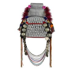 Akha artisan Thikaporn is proud to present this stunning headdress, hand-crafted by her own mother, Sadaporn. She adorns the cotton headdress with an aluminum trapezoid cap as well as beads and pendants. A waterfall of Thai coins dating from 1952 to 1965 is flanked by multicolored beads carved of little leaf boxwood and glass. Colorful feathers complete the stunning design of this headdress. Originally from Yunan in China, Akha people live in Thailand's northern hills. Akha women are well known Colorful Home Decor, I Quit My Job, Work Routine, Creative Embroidery, People Around The World, Getting Old, Bungalow Rose, Headdress, Festival Captain Hat