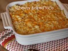 a casserole dish with cheese and bread in it on a red and white napkin