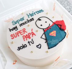 a birthday cake with the words super hero on it