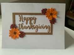 a happy thanksgiving card with flowers on it