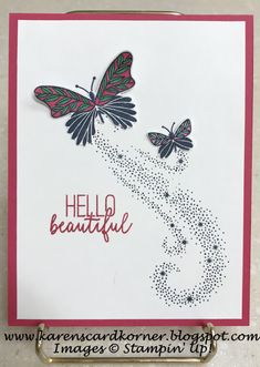 a handmade card with two butterflies on it