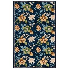 a blue rug with flowers and leaves on it