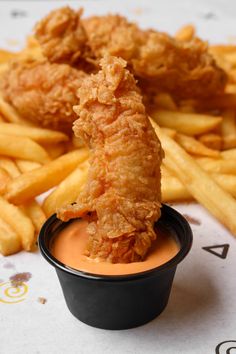 fried chicken and french fries with dipping sauce