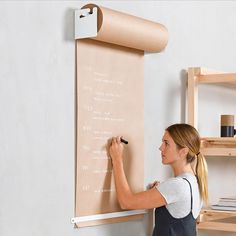 brown paper roller Bakers Menu, Cafe Signage, Wooden Pegboard, Hanging Drying Rack, George And Willy, Café Design, Teachers Lounge, Paper Dispenser, Paper Roll Holders