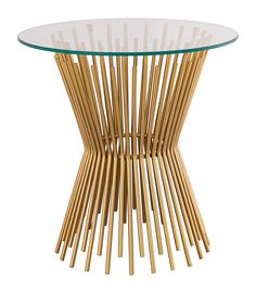 a round glass table with wooden sticks on the bottom and gold metal frame around it