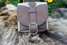 Combination of brown and grey leather belt pouche. Dimensions:(L)-13cm.,(W)-5cm.,(H)-13cm. Fantasy Pouch Belt, Leather Hip Pouch Belt Bags, Midevil Belt Pouch, Fantasy Leather Belt Pouch, Leather Belt Bag Medieval, Purse Pouch, Grey Leather, Leather Belt, Brown And Grey