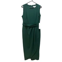 Calvin Klein Womens Pleated Tulip Hem Midi Sheath Dress Nwt Brand: Calvin Klein Size: 8 Color: Malachite Approx. 46 1/4” Long From Center Back Neck To Hem. Tailored Fit Through The Chest, Waist, And Hips; Sits Close To The Body Round Neckline; Sheath Silhouette Zipper Closure At Center Back Banded Waist; Ruched At Skirt; Tulip Hem Unlined Viscose/Nylon/Spandex Hand Wash Hunter Green Calvin Klein Dress, Calvin Klein Sheath Midi Dress For Work, Elegant Green Calvin Klein Midi Dress, Knee Length Sweater Dress, Knee Length Sweater, Houndstooth Sweater, Grey Midi Dress, Yellow Midi Dress, Chiffon Midi Dress