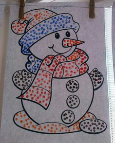 a drawing of a snowman on a piece of paper