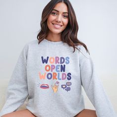 This speech language pathology sweatshirt is the perfect gift for your favorite speech teacher, SLP, or the recent grad! This cozy shirt celebrates the power of words and makes a thoughtful, comfy present. Wrap them in warmth and appreciation for the magic of communication! PRODUCT DETAILS The Gildan 18000 sweatshirt is a heavy blend crewneck sweatshirt made of 50% cotton and 50% polyester. It is available in our shop in a range of sizes from Small to 3XL. Here are some more details about the product: - Medium-heavy fabric (8 oz. per sq. yd.) - Pre-shrunk - Pill-resistant and softer air-jet spun yarn - Double-needle stitching at waistband and cuffs - 1x1 rib with spandex - Quarter-turned to eliminate center crease SIZING *Please note - you should order 1-2 sizes larger than your usual size Speech Language Pathologist Assistant, Speech Language Pathologist Gifts, Speech Teacher, Slp Shirts, Gift For Graduation, Speech Path, Speech Language Pathologist, Speech Room, Grad Student