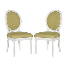 a pair of white chairs with yellow upholstered back and seat cushions on each side