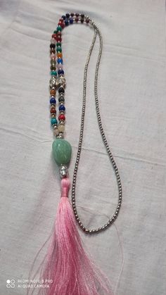 Green Turquoise, Multi Color Gemstone Fancy Necklace Japa Mala Long Tassel Necklace semi-precious Gemstone Round Beads Stone - 1. Green Turquoise With Silver Plated Pendant,Length - Approx - 37 inch 2. Multi Gemstone With Kalsidoni Tumble,Length - Approx - 40 inch The message it emits is the strong vibration of unconditional love, joy, warmth and healing. As quartz crystals are profound amplifiers of energy, it may help to kindle happiness, love, romantic feelings and sensuality. It is good for Long Tassel Necklace, Pumpkin Bead, Carnelian Bracelet, Gem Shop, Fancy Necklace, Necklaces, 108 Bead, Green Turquoise, Natural Beads