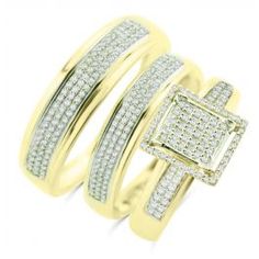 two yellow gold rings with diamonds on each one and the other ring in white gold