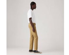 Levi's® XX Chino;don't call them khakis. They're softer, with just the right amount of stretch. Slightly roomier than our Slim Taper, our XX Chino Standard Taper Pants have a little more give but look just as clean and contemporary. A modern take on the classic chino Made with supersoft fabric Versatile fit that tapers down to the ankle Woven with a hint of stretch for all-day comfort and easy movement Features a hidden zip-secure pouch in the right pocket This garment feels as good as it looks, thanks to a soft, brushed interior that'll keep you warm and comfy For our vintage lovers: We garment-dyed this piece to give it that lived-in look and broken-in feel Levi's Straight Bottoms For Streetwear, Levi's Straight Casual Pants, Levi's Stretch Casual Pants, Casual Straight Levi's Pants, Casual Stretch Levi's Pants, Levi's Casual Straight Bottoms, Levi's Straight Casual Bottoms, Taper Pants, White Levis