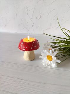 Create a mesmerizing ambiance with this DIY candle decor project, as the warm glow and subtle flicker of candlelight transform any space into a cozy and inviting retreat. Stick Decor, Clay Candle Holders, Mushroom Tea, Clay Candle, Amanita Muscaria, Diy Candle Holders