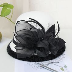 Category:Kentucky Derby Hat,Hats; Embellishment:Appliques,Feather,Split Joint,Pure Color,Trim,Splicing,Color Block,Tulle; Gender:Women's; Quantity:1 PC; Theme:Fashion; Style:Vintage Style,Elegant; Hats Category:Bowler / Cloche Hat,Bucket Hat,Fedora Hat; Occasion:Holiday,Casual,Kentucky Derby; Material:Artificial feather,Poly / Cotton Blend; Front page:WE; Shipping Weight:0.15; Listing Date:11/16/2022; Head Circumference: Cappello Cloche, Hat Fedora, Queen Love, Kentucky Derby Hat, Derby Hat, Drag Queens, Cloche Hat, Casual Hat, Wedding Hats