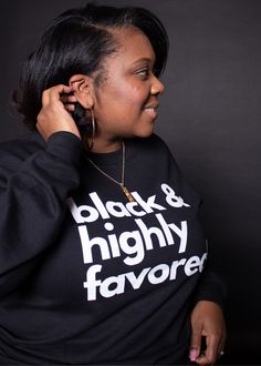 This sweatshirt will not only remind yourself, but let everyone else know who you are (black) and whose you are in Christ! (highly favored) Scripture featured on left sleeve: “Greetings, you who are highly favored! The Lord is with you.” -Luke 1:28 MATERIAL: 50/50 Cotton/Poly FIT: Unisex Size. Ladies size down for fitted look. Fellas true to size Afrocentric Accessories, Fun Phrases, Dope Tees, Highly Favored, T Shirt Time, Outfit Quotes, Luke 1, Women Blouses Fashion, Remind Yourself