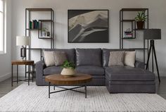 a living room filled with furniture and decor