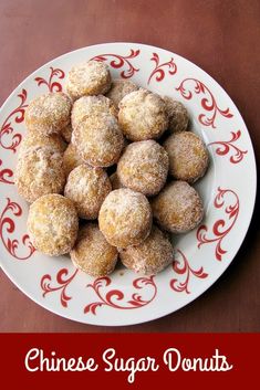 chinese sugar donuts on a red and white plate with the words, chinese sugar donuts