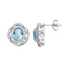 Featuring simulated aquamarine center stones and shimmering cubic zirconia accents, these sterling silver stud earrings offer a lovely look.EARRING DETAILSLength: .59 in. Backings: postMetal: sterling silverPlating: rhodiumPackaging: boxedSTONE DETAILSStone type: simulated aquamarineTotal weight: 1 7/8 ct.Shape: ovalSetting: prongCUBIC ZIRCONIA DETAILSTotal weight: 5/8 ct.Shape: roundSetting: prongGemstones may have been treated to enhance their appearance. Special care may be required.  Size: O Oval Cubic Zirconia Birthstone Earrings, Oval Birthstone Earrings In Cubic Zirconia, Blue Oval Earrings With Diamond Accents, Oval Stud Earrings, Sterling Silver Stud Earrings, Oval Earring, Cubic Zirconia Earrings, Round Stud Earrings, Silver Stud Earrings