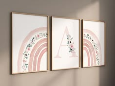 three framed art prints hanging on the wall