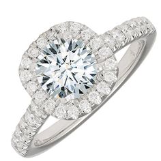 a diamond ring with two rows of diamonds on the band and an oval center surrounded by round