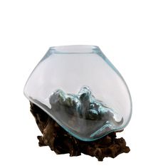 a glass bowl with rocks in it